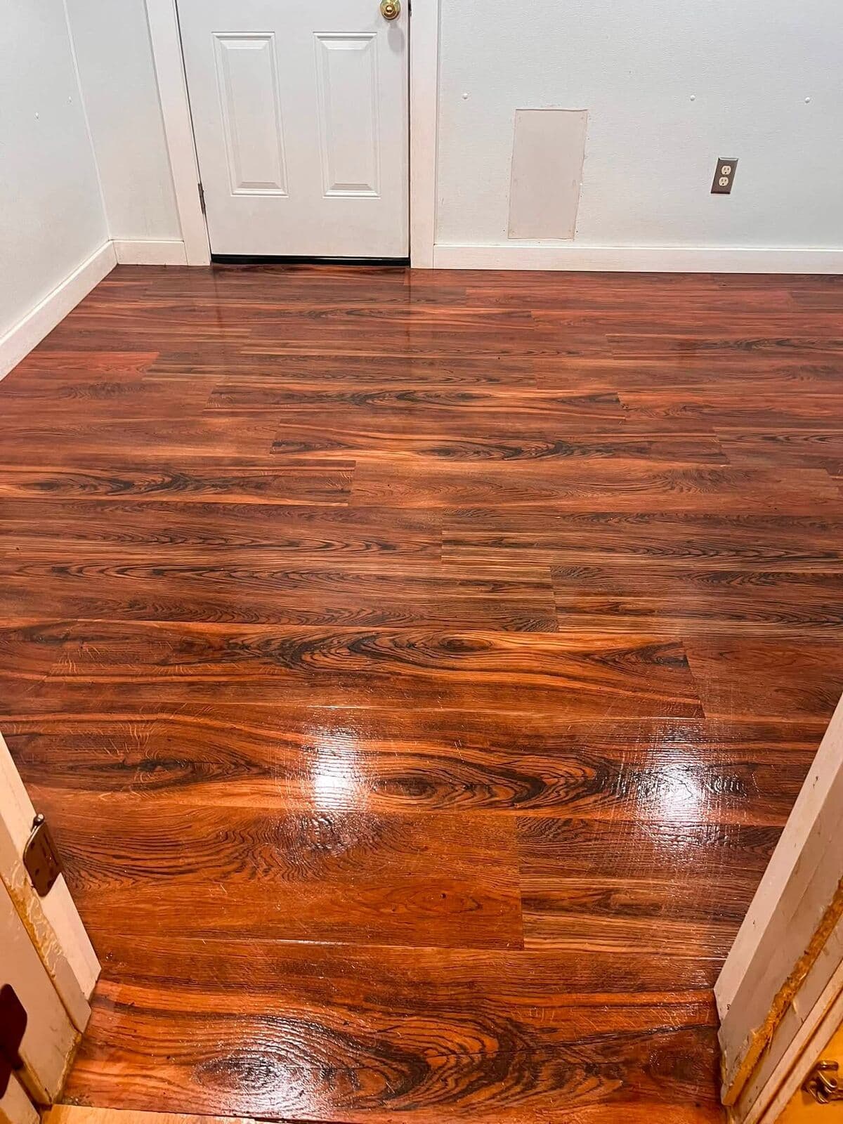 Hardwood floor polished to a mirror shine